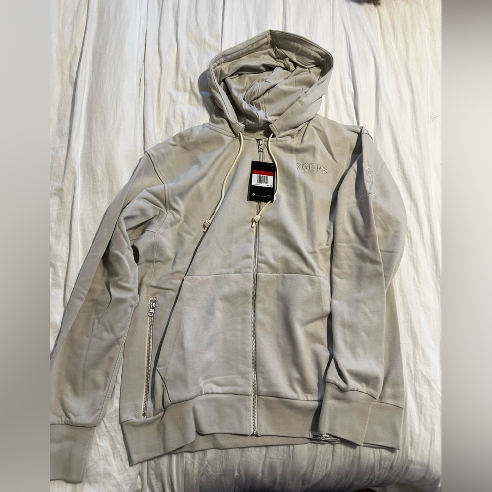 New Nike Men’s Zip up long sleeve.  NBA licensed for 76ers.